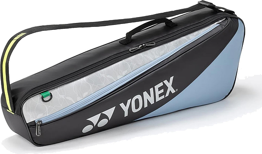 The Yonex BA52523EX Club 3 Racket Badminton Bag in black and blue features a zippered main compartment for up to 3 rackets, a side pocket, and an adjustable shoulder strap—ideal for carrying your badminton gear.