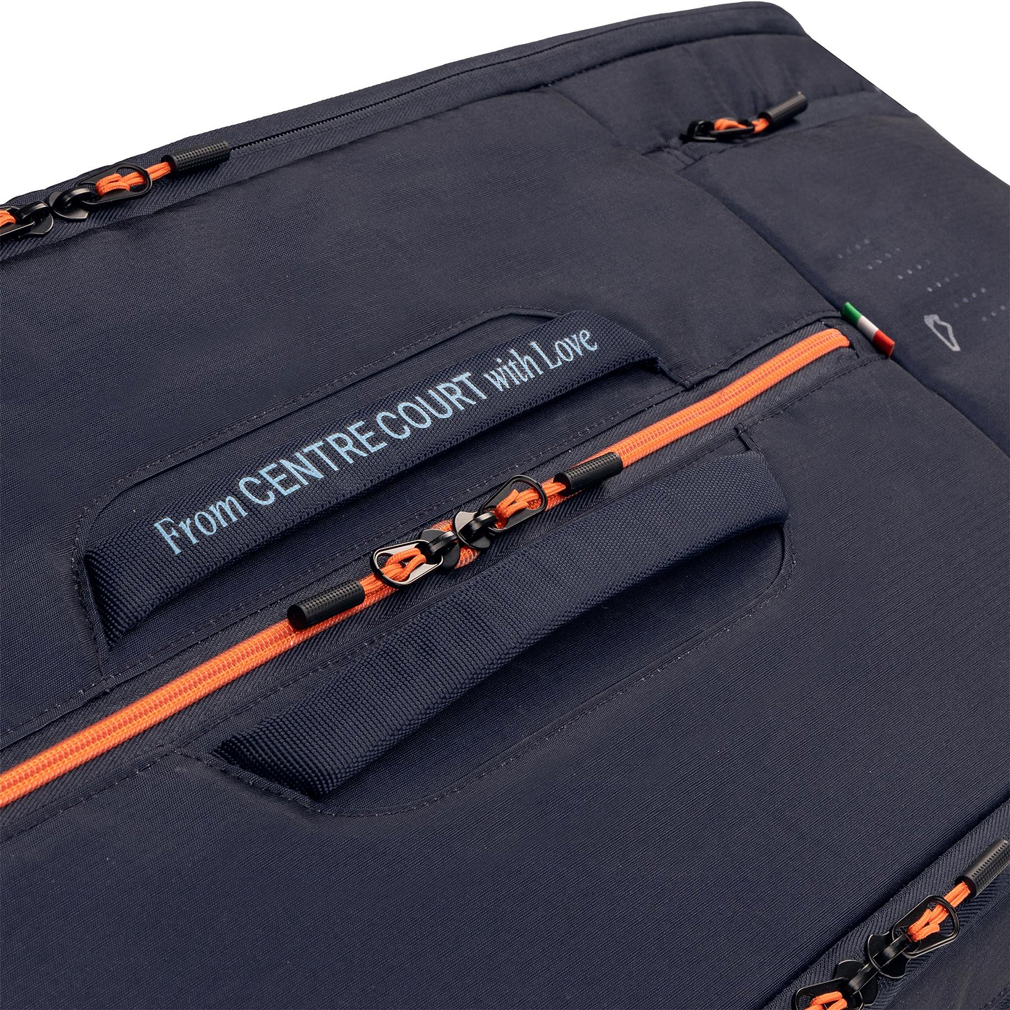 Close-up of the HEAD Pro 12 Racket Badminton Bag XL - Navy, featuring orange zippers, a "From CENTRE COURT with Love" tag, multiple compartments, zipper pulls, and advanced HEAD CCT+ climate control technology.