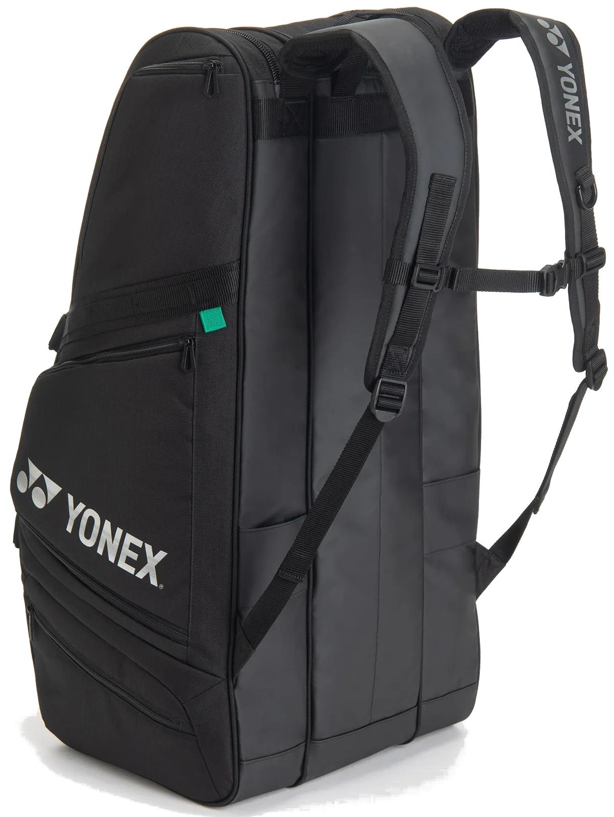 The Yonex BA72629EX Gearlogic 9 Racket Badminton Bag in black features shoulder straps, multiple zippered compartments, and white Yonex logos—ideal for carrying up to nine rackets and all your badminton gear.