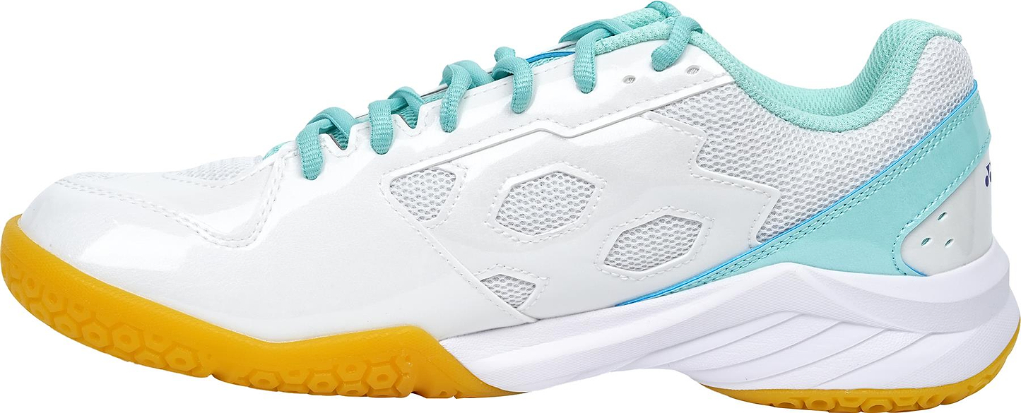 The Yonex Power Cushion SHB 101 Badminton Shoes in White/Mint feature teal laces, light blue heel, mesh panels, and a yellow textured sole for superior shock absorption, shown side view against a plain background.