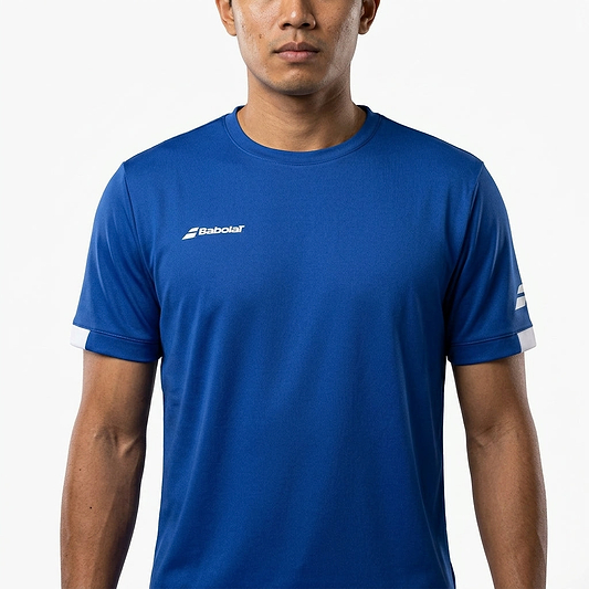 A man wearing the Babolat Play Mens Crew Neck Badminton T-Shirt in Sodalite Blue stands against a white background, arms relaxed at his sides, with white Babolat logos visible on the chest and sleeve.