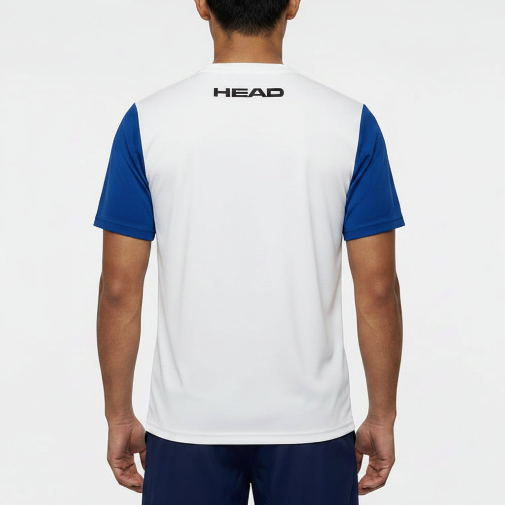 Seen from behind, a person wears the HEAD Club Tech 25 Mens Badminton T-Shirt in Royal Blue/White, featuring blue sleeves and a black "HEAD" logo on the upper back. The breathable microfiber material stands out against a plain white background.