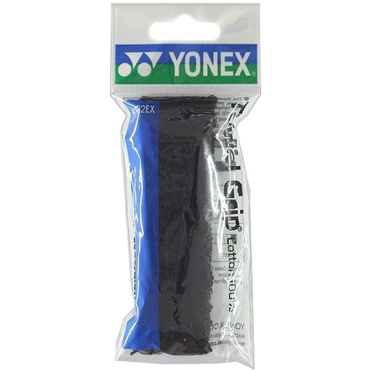 Packaged Yonex AC402EX Badminton Towel Grip in black, designed for tennis or badminton rackets, it boasts an absorbent cotton surface to ensure a comfortable grip. It comes inside a clear plastic pouch featuring blue and white Yonex branding at the top.
