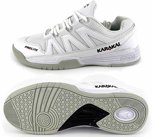 Introducing the Karakal KF Pro Lite Badminton Shoes in White, designed for lateral stability. The top shoe showcases the "Karakal" and "Prolite" brand logos on the side. The bottom shoe is equipped with a textured sole featuring a honeycomb pattern and circular design, offering enhanced comfort with its shock-absorbing gel insole.