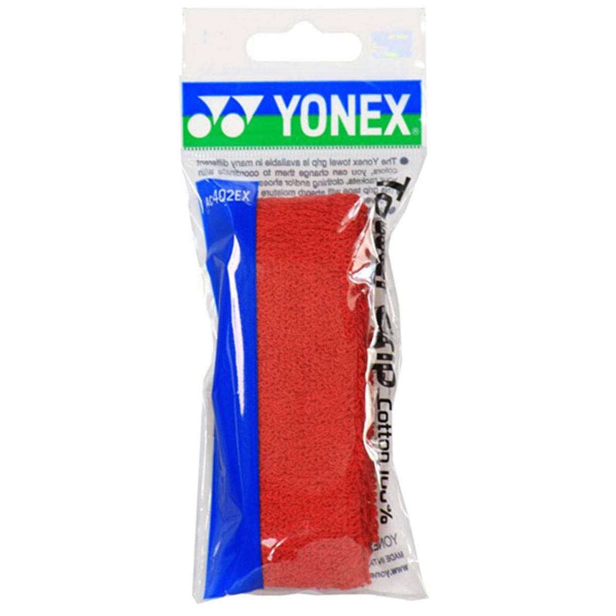A packaged Yonex AC402EX Badminton Towel Grip in red, displaying the Yonex brand prominently on top. Designed for optimal absorbency, it is carefully enclosed in clear plastic packaging.