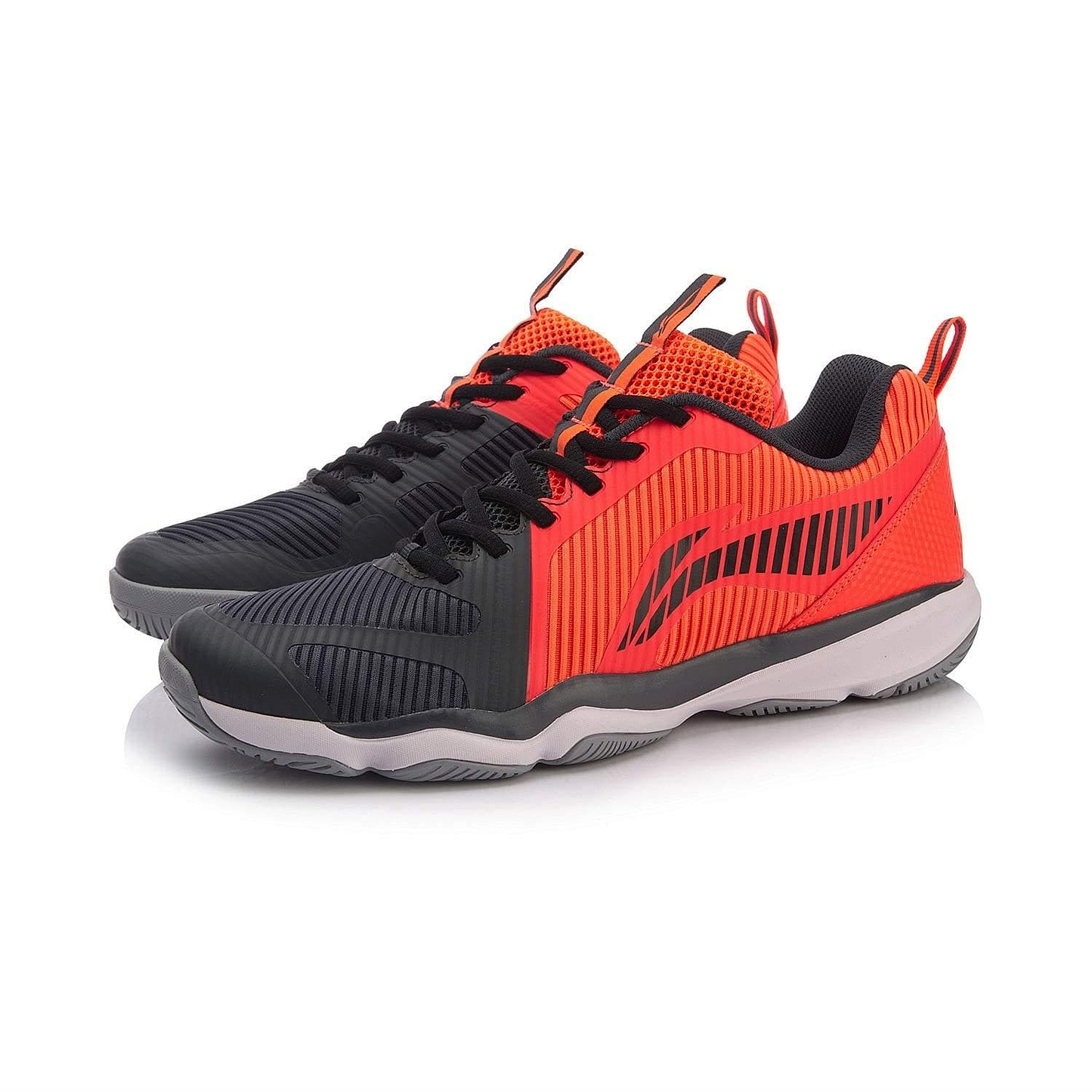 Introducing the Li-Ning Ranger TD Men's Badminton Shoes, a fashionable sports shoe from Li-Ning that features vibrant red and black breathable mesh uppers. These shoes showcase a sleek design with striped patterns, complemented by black laces and a white biometric outsole for improved performance during your game.
