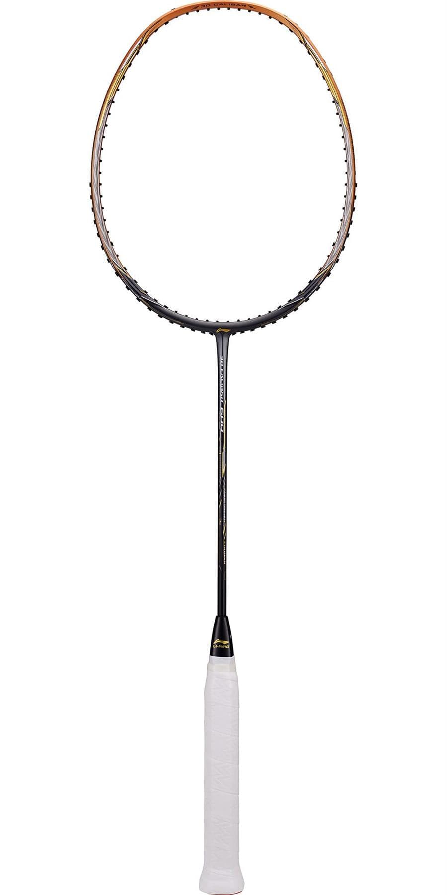 A Li-Ning 3D Calibar 600 Drive Badminton Racket in black and gold is prominently displayed against a plain white background. The racket features a head-heavy balance and is showcased with an empty string area, emphasizing its sleek frame and white grip.