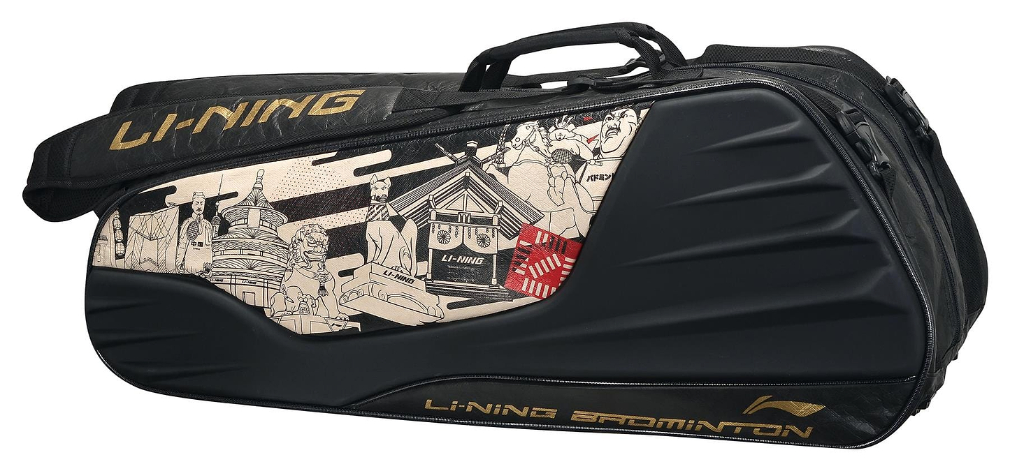 A Li-Ning 9 in 1 Limited Badminton Racket Bag - Beijing Tokyo in black, featuring gold accents and a graphic design with illustrations of people and buildings on one side, includes a convenient shoe compartment.