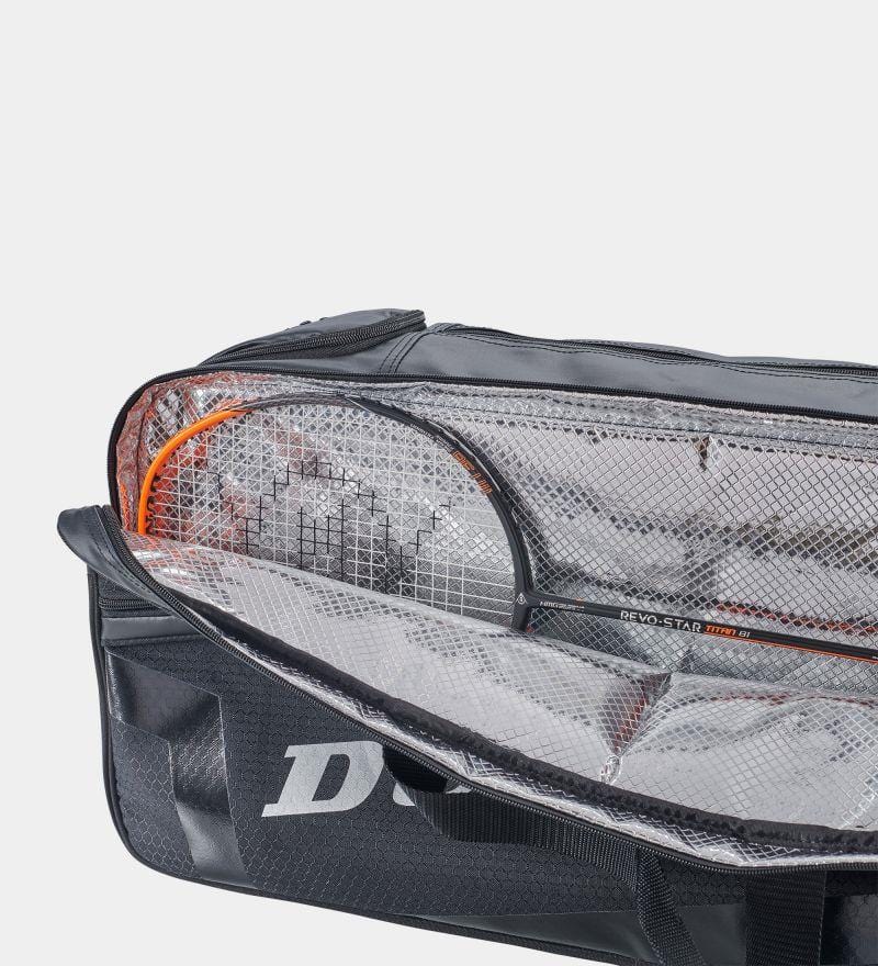 The Dunlop Elite Rectangular Badminton Bag - Black reveals a sleek design with a visible Dunlop logo. Inside, it has a mesh compartment holding a partially visible tennis racket and includes a thermo-insulated section to optimally protect gear.