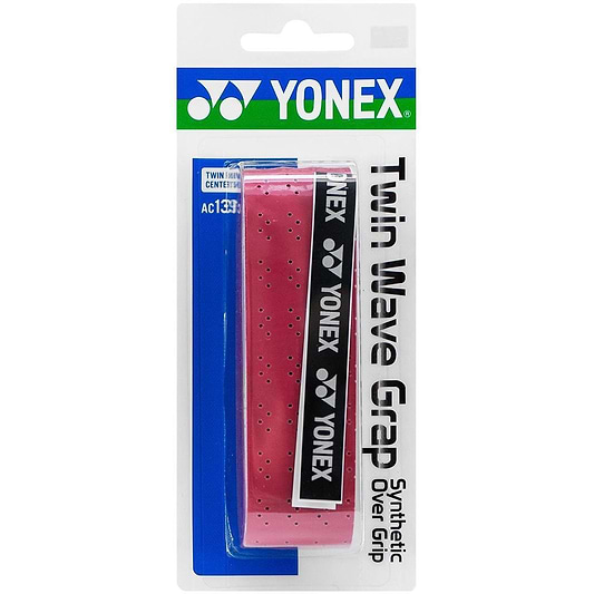 The Yonex AC139EX Twin Wave Grap Badminton Overgrip, designed with a tacky feel and a twin rubber center strip for enhanced comfort, is an excellent synthetic overgrip suitable for badminton or tennis rackets. It features a striking red color with black branding and is packaged in a clear package adorned with a distinctive blue and green label.