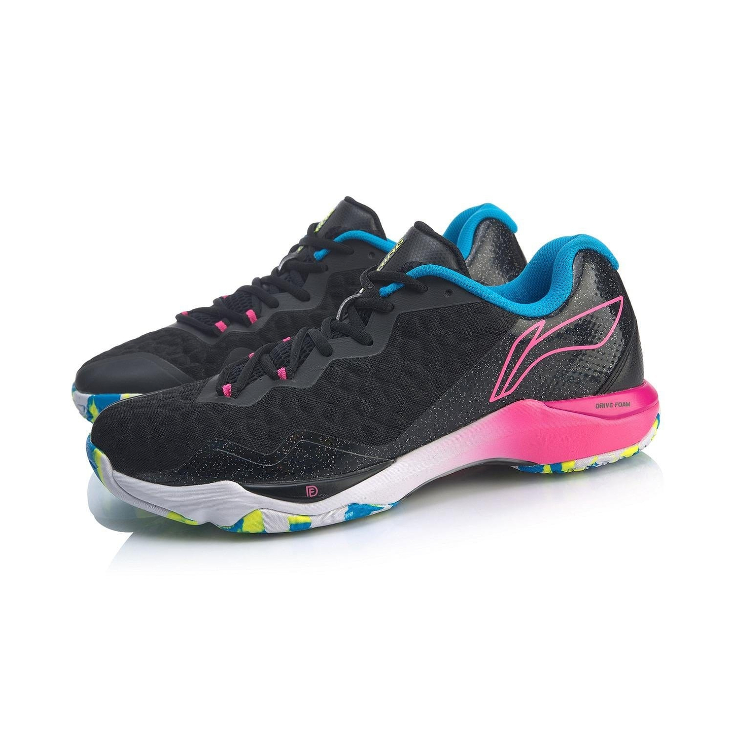 Introducing the Li-Ning Dagger II SE Men's Badminton Shoes: a stylish pair of black shoes enhanced with vibrant pink accents. They feature a colorful outsole adorned with patches of blue, yellow, and pink. Equipped with Drive Foam technology, these shoes offer a sleek and sporty design, perfect for badminton or casual wear.