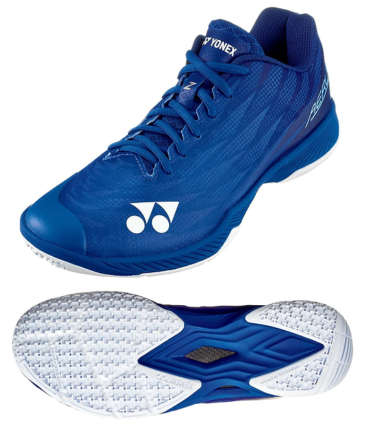 Introducing the Yonex Power Cushion Aerus Z2 Mens Badminton Shoes in navy blue, showcasing the iconic white logo and Power Cushion technology for comfort. With blue laces and a textured white sole for extra grip, its sleek design is perfect for indoor sports.