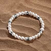 Picture of Sacred Wisdom - Pearl Mantra Bracelet