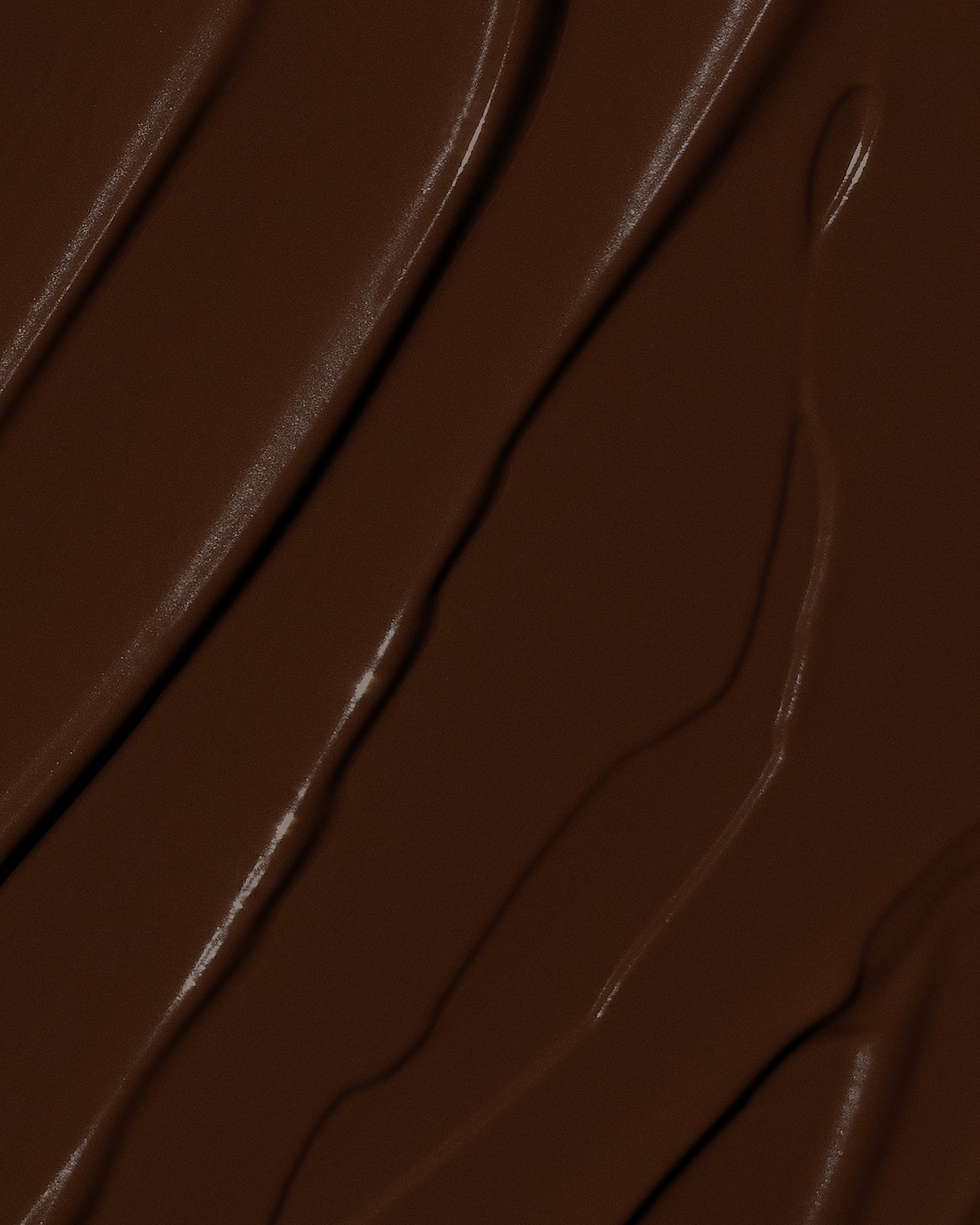 Texture close-up of MÁDARA Organic Skincare skinonym mocha A6099 �swatch demonstrates consistency and finish.