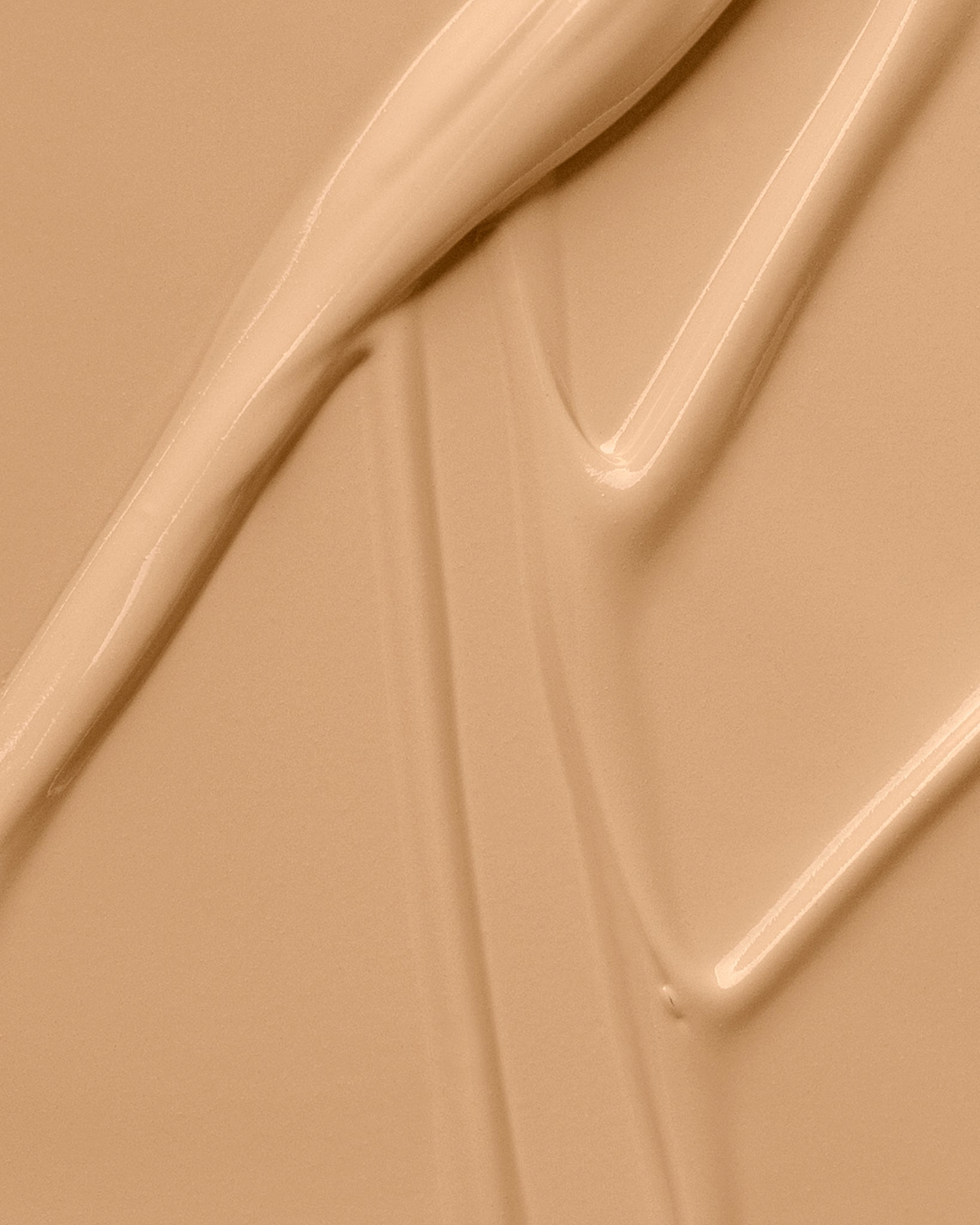 Texture close-up of MÁDARA Organic Skincare skinonym sand A6085 �swatch demonstrates consistency and finish.