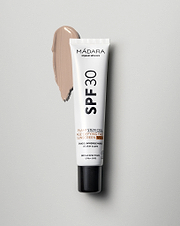 MÁDARA Organic Skincare plant stem cell age defying sunscreen spf30 A3415 mineral sunscreen product photo on plain background.