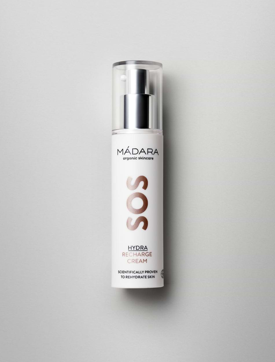 50 ml pump bottle of Madara Organic Skincare SOS Hydra Recharge skin hydrating face cream on a grey background