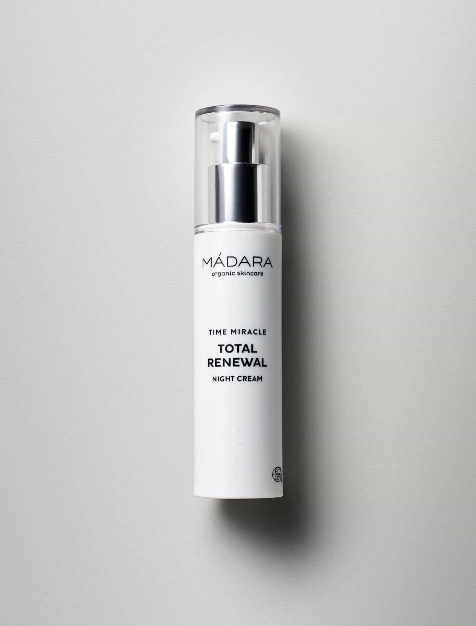 50 ml pump bottle of Madara Organic Skincare Time Miracle Total Renewal Night Cream on a grey background