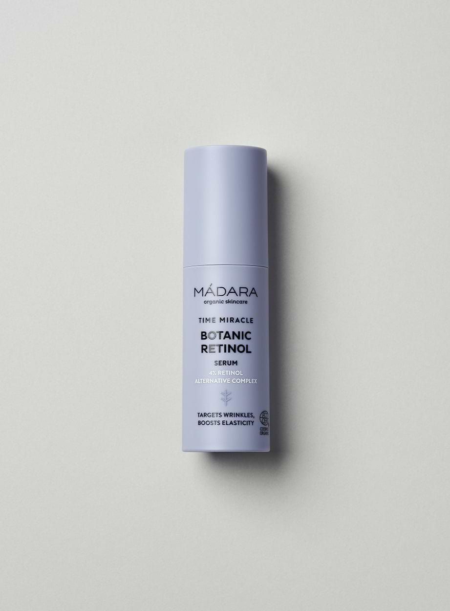 A 30 ml bottle of Madara Organic Skincare Time Miracle Botanic Retinol Serum on a grey background