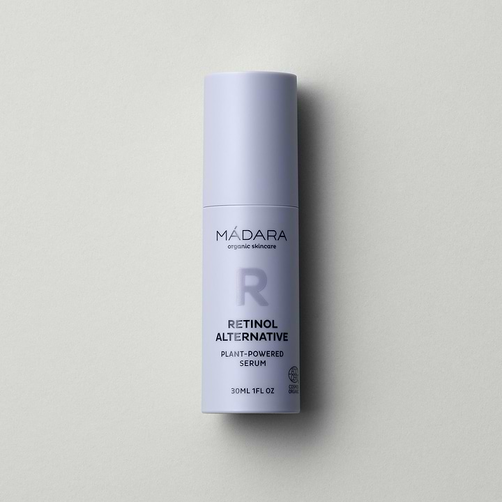 30ml pump bottle of Madara Cosmetics Retinol Alternative Plant-Powered Serum for face on a grey background