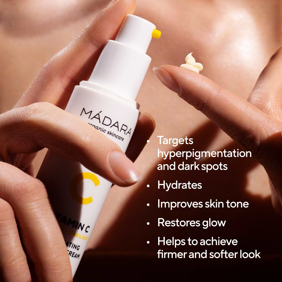 Bottle of Madara Organic Skincare Vitamin C Face Cream with Bullet Points Highlighting Its Key Benefits