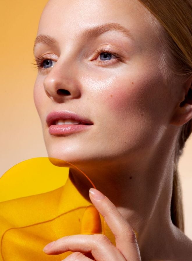 Vitamin C skincare blog hero image with a woman`s face