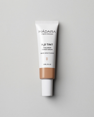 MÁDARA Organic Skincare hyaluron tinted serum wild flower A3514 serum product photo on plain background.