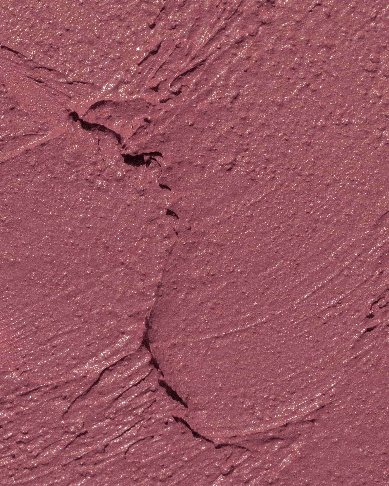 Texture close-up of MÁDARA Organic Skincare cool nude lipstick A6301 �swatch demonstrates consistency and finish.