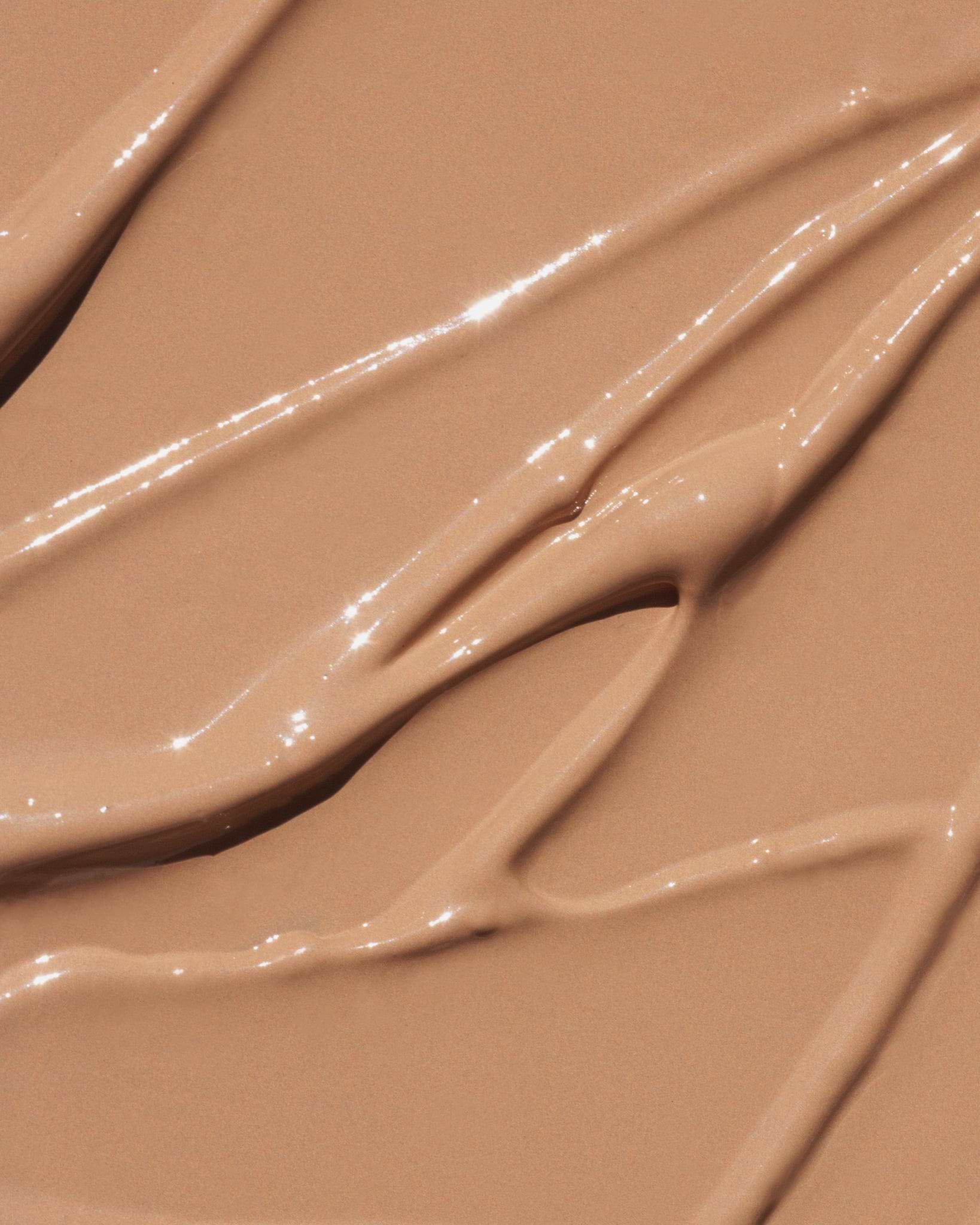 Texture close-up of MÁDARA Organic Skincare the concealer almond A6103 concealer �swatch demonstrates consistency and finish.