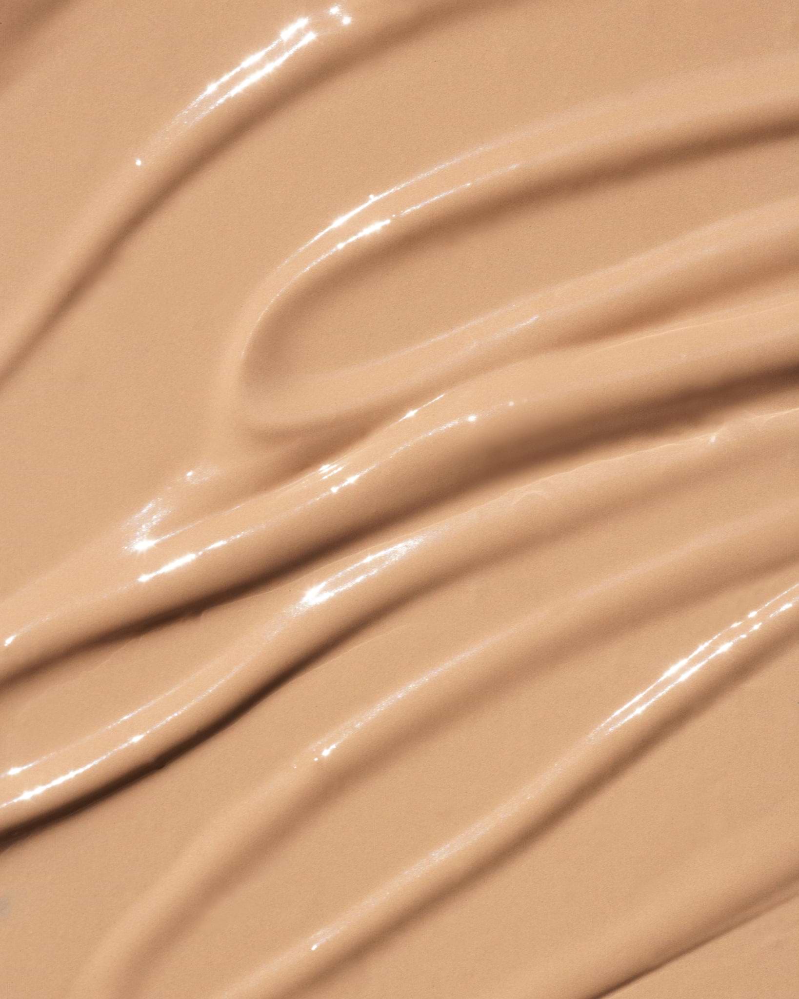 Texture close-up of MÁDARA Organic Skincare the concealer honey A6102 concealer �swatch demonstrates consistency and finish.
