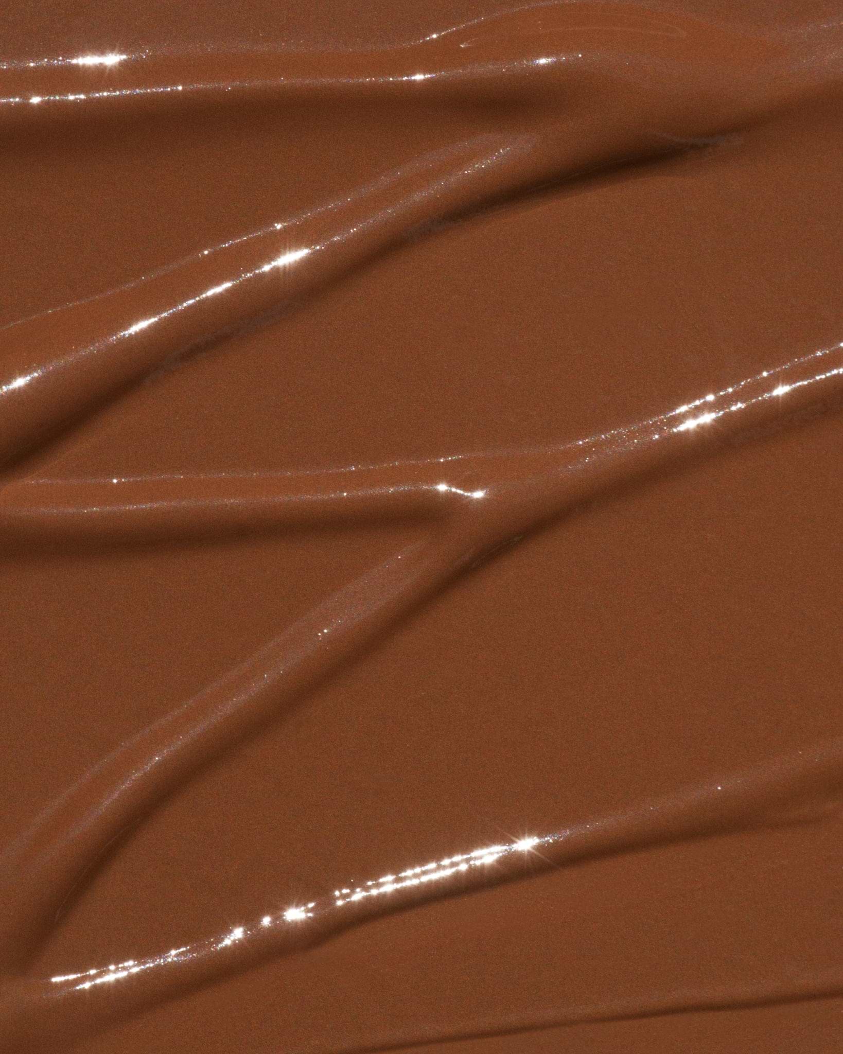 Texture close-up of MÁDARA Organic Skincare the concealer mocha A6105 concealer �swatch demonstrates consistency and finish.