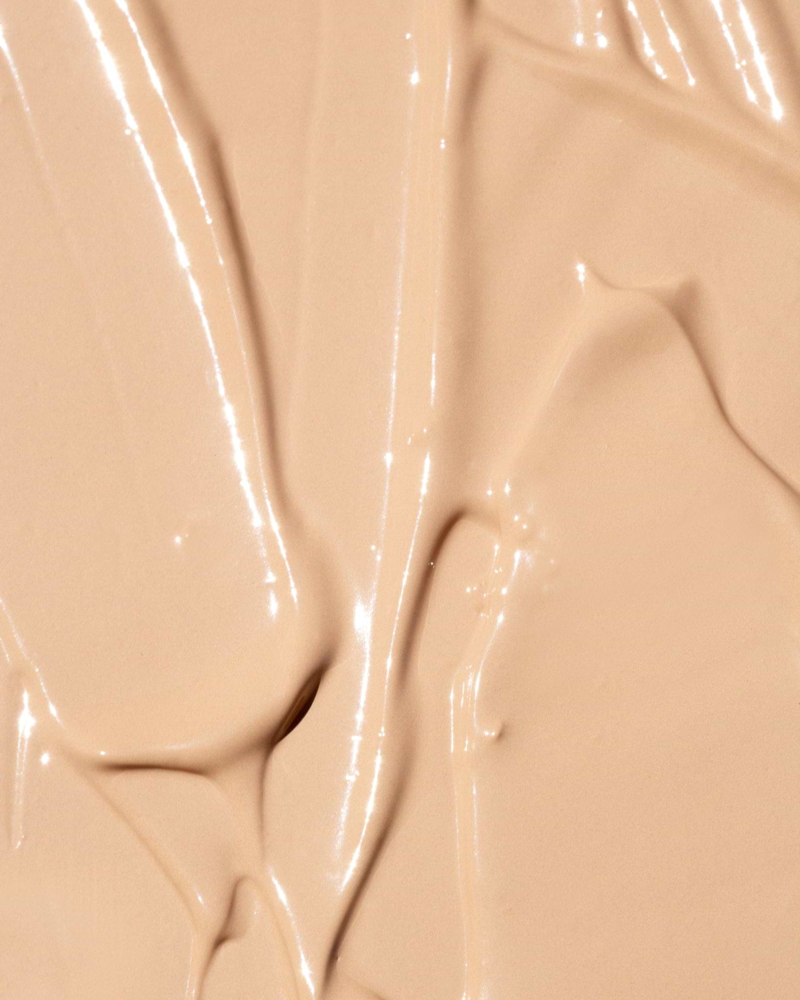 Texture close-up of MÁDARA Organic Skincare the concealer warm latte A6108 concealer �swatch demonstrates consistency and finish.