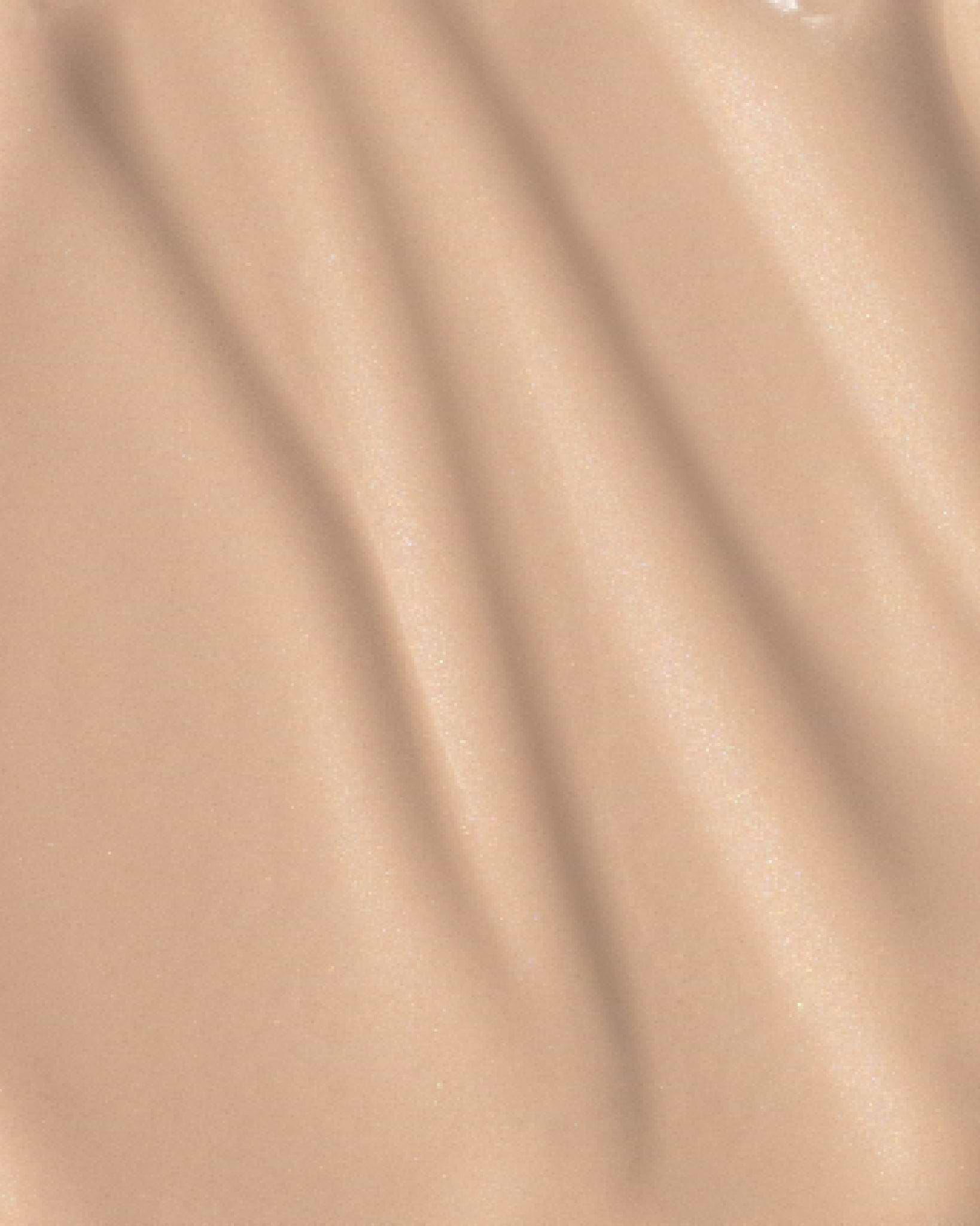 Texture close-up of MÁDARA Organic Skincare skin equal ivory A6053 �swatch demonstrates consistency and finish.
