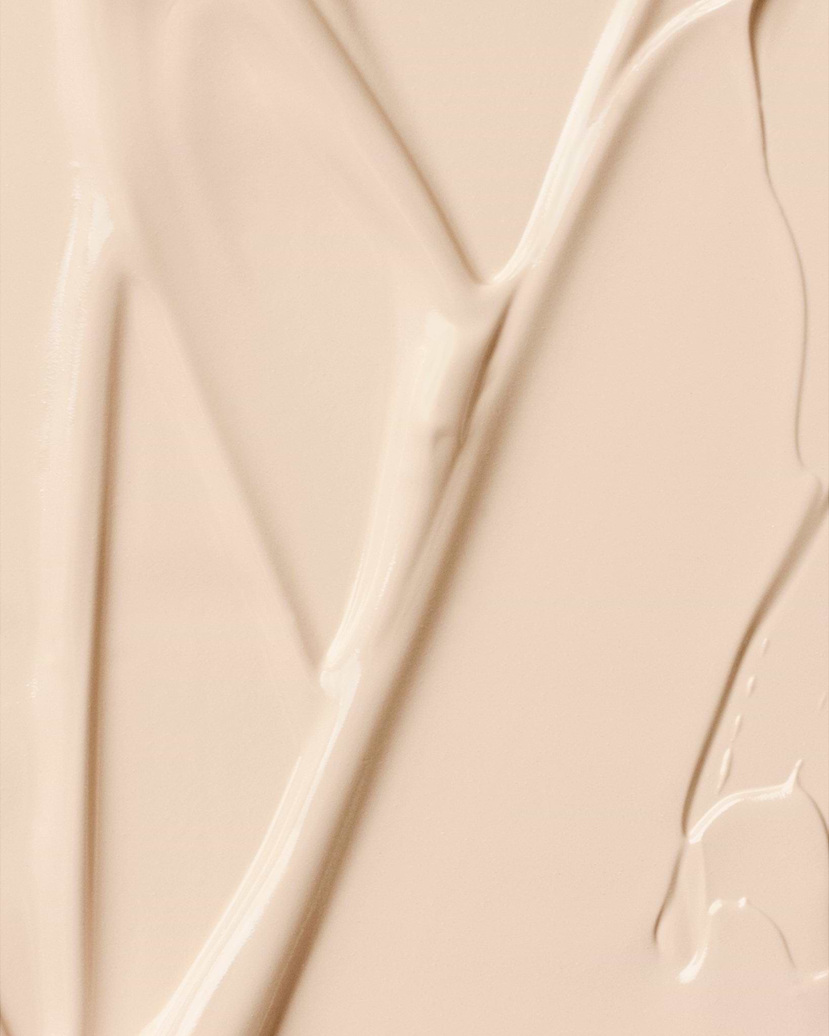 Texture close-up of MÁDARA Organic Skincare skinonym porcelain A6081 �swatch demonstrates consistency and finish.