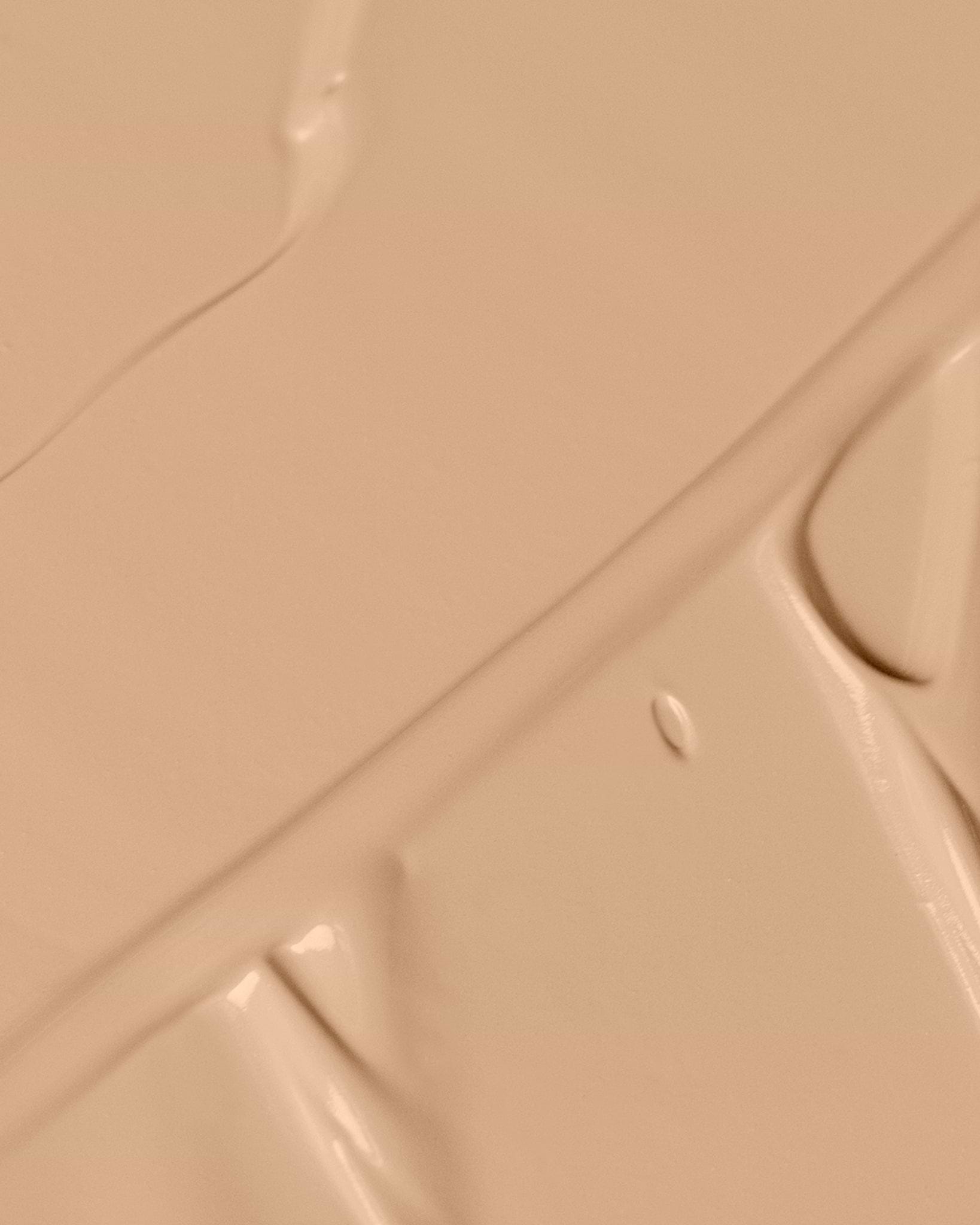 Texture close-up of MÁDARA Organic Skincare skinonym true beige A6084 �swatch demonstrates consistency and finish.