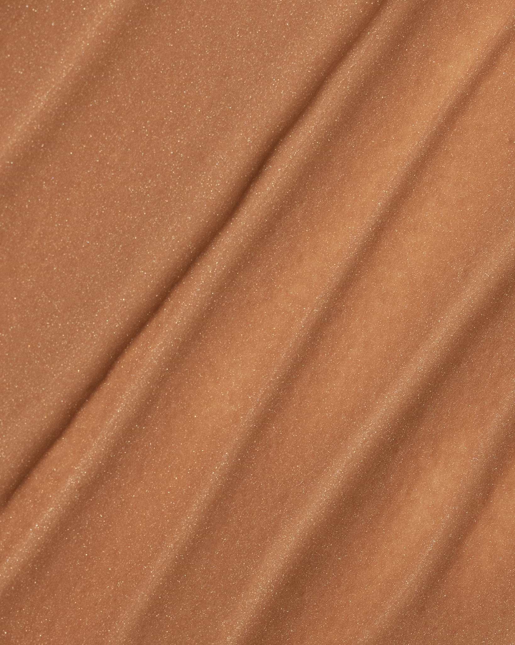 Texture close-up of MÁDARA Organic Skincare wild flower A3514 �swatch demonstrates consistency and finish.