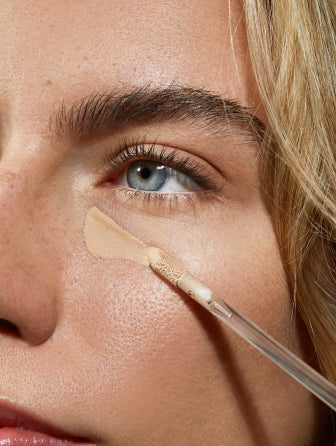 Close-up of Madara Luminous Perfecting Concealer model wearing shade sand