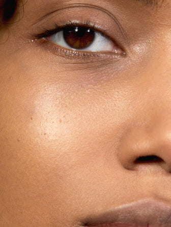 Close-up of Madara Luminous Perfecting Concealer model wearing shade pine