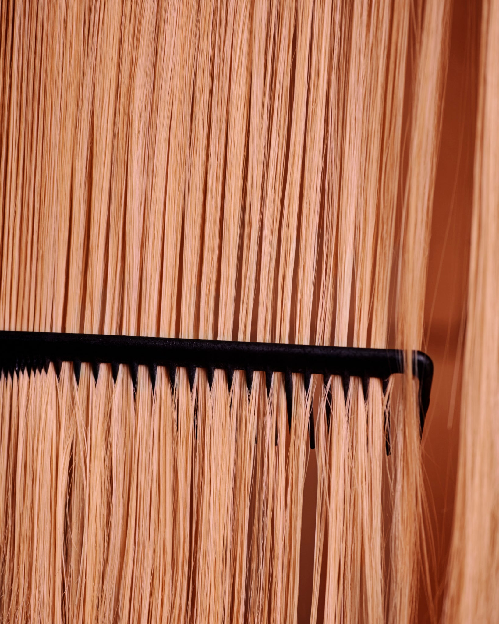 MADARA Cosmetics GROW haircare results showing thicker, stronger-looking blonde hair with smooth texture and healthy shine