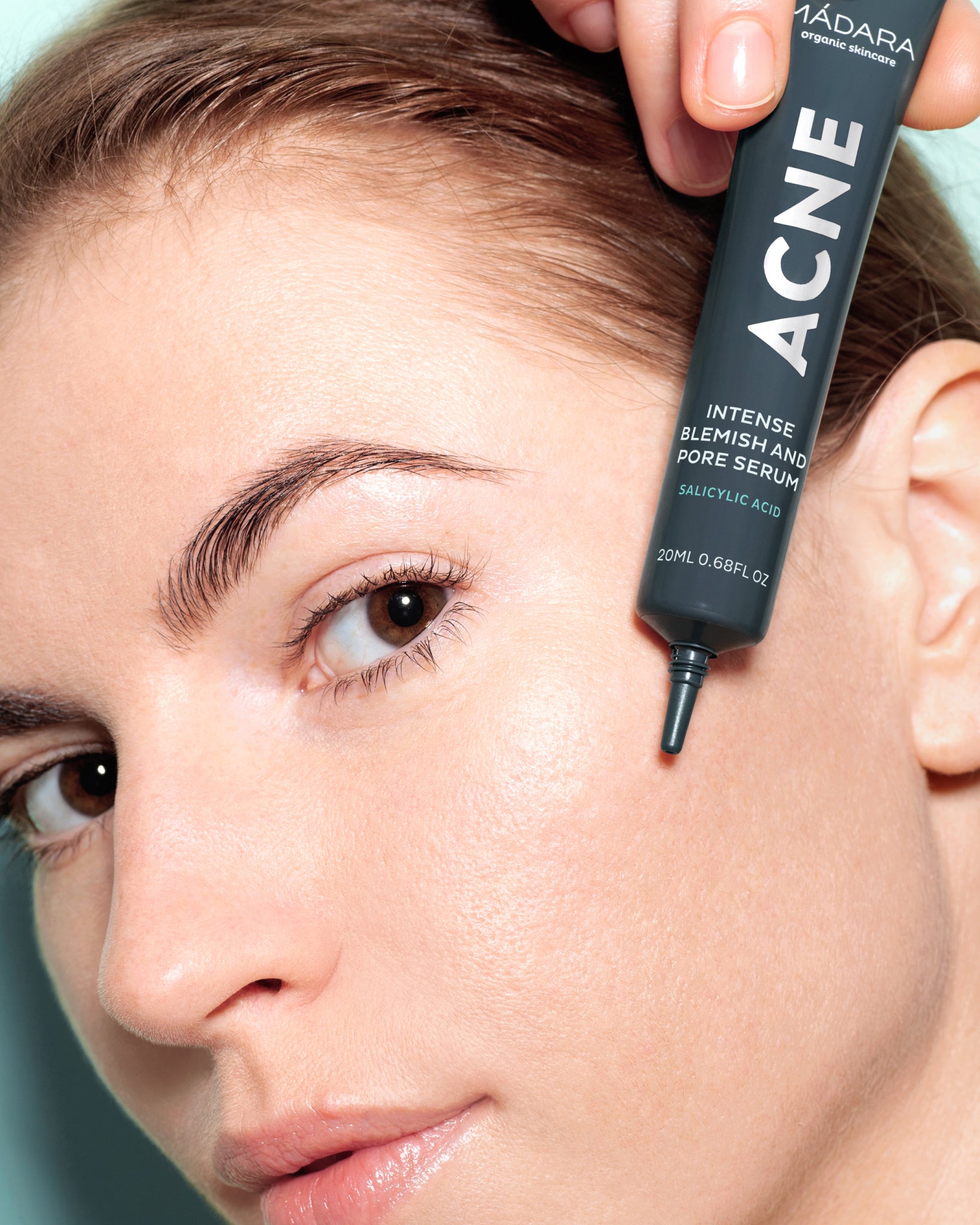 Mádara Acne serum on model