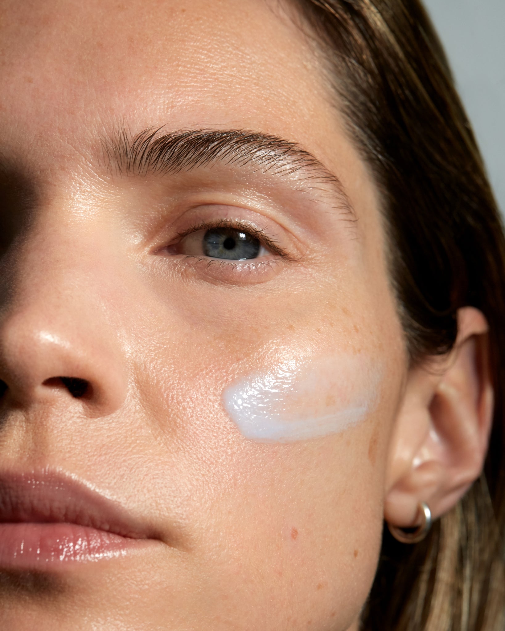 MADARA Retinol alternative serum on model