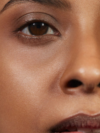 Close-up of Madara Luminous Perfecting Concealer model wearing shade amber