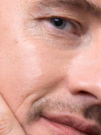 Madara H2O Hyaluron Tinted Serum model wearing shade moon flower