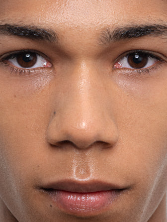 Madara H2O Hyaluron Tinted Serum model wearing shade wild flower