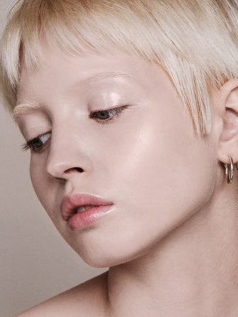 Madara Skin Equal Soft Glow foundation model wearing shade porcelain