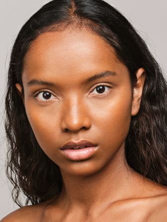 Madara Skin Equal Soft Glow foundation model wearing shade caramel