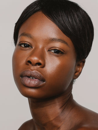 Madara Skin Equal Soft Glow foundation model wearing shade chestnut