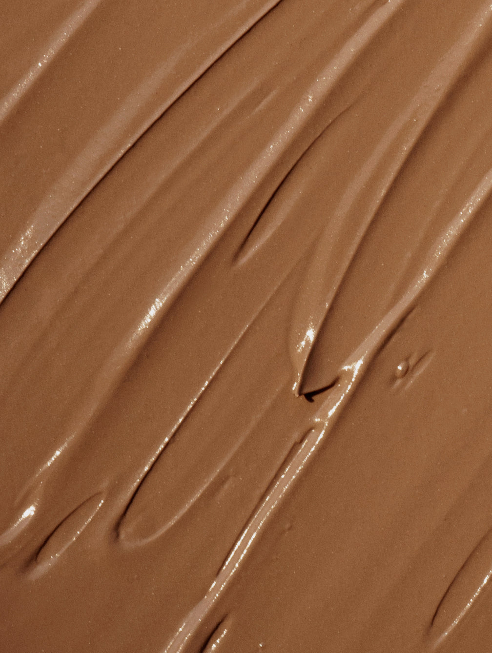 Close-up of City CC cream texture shade tan