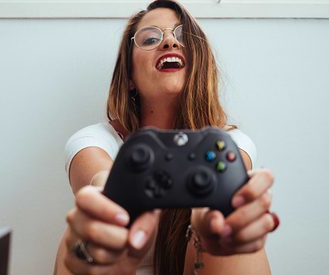 girl playing video games high