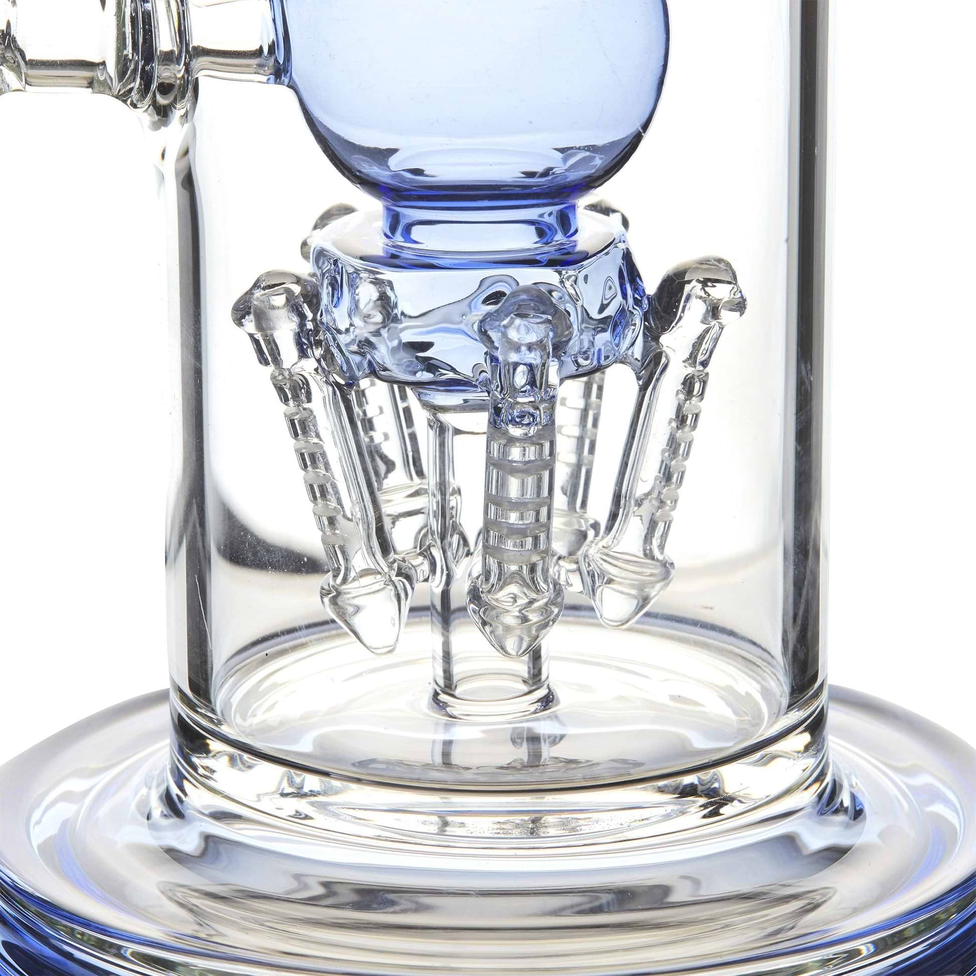 Bottom low angle shot of the matrix percolator and blue base of a 22-inch clear glass bong smoking device
